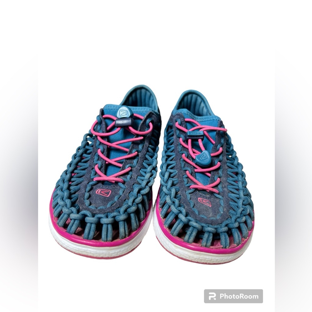 Keens Uneek in teal and berry
